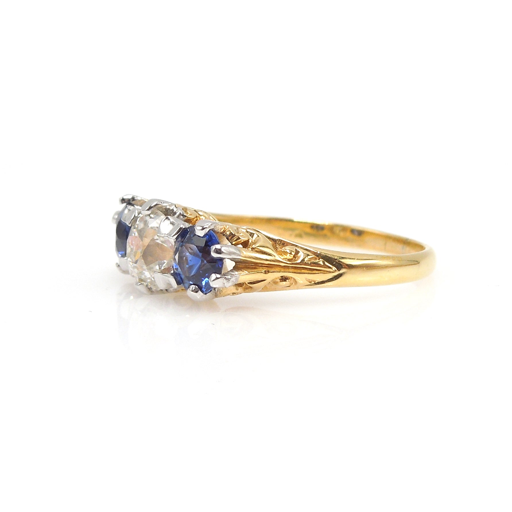 Edwardian Platinum and Yellow Gold Three Stone Ring with Sapphires