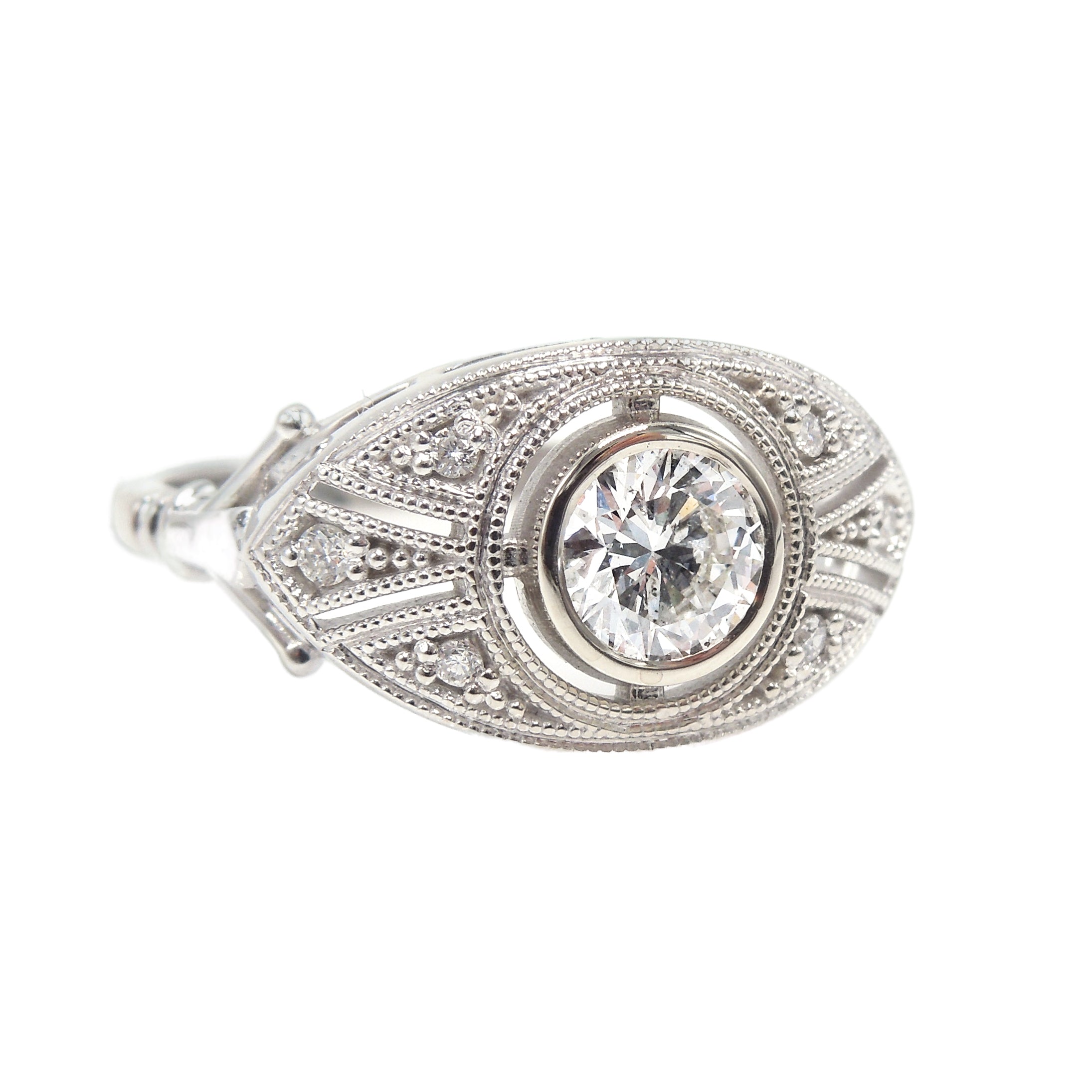 Almond Shaped Art Deco Style Engagement Ring with Half Carat Bezel Set Diamond
