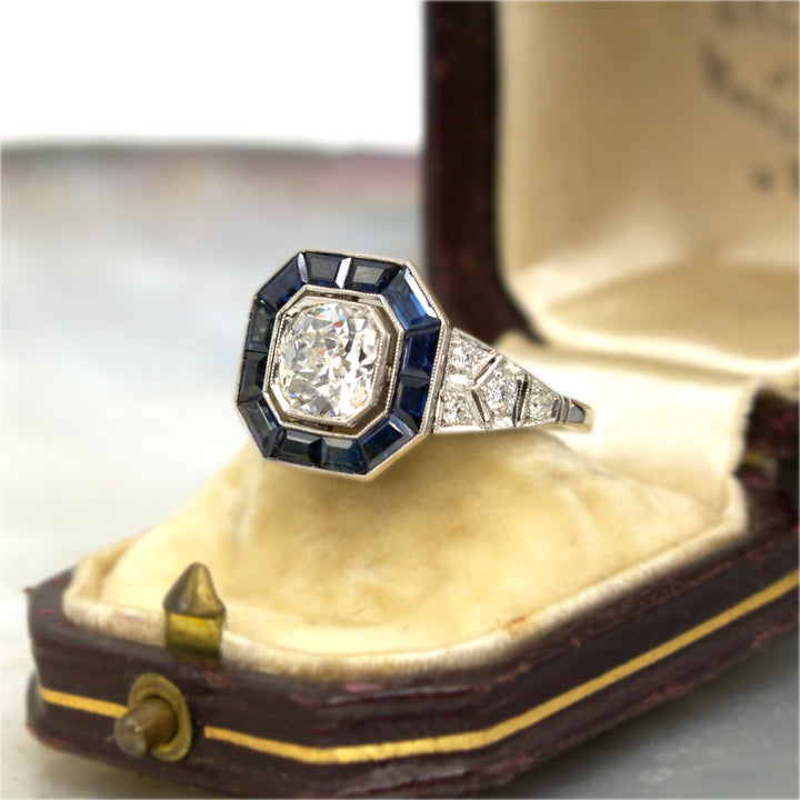 Art Deco Cushion 1.06 Carat Old Mine Cut Diamond Ring with Calibre Cut Sapphire Halo in Platinum