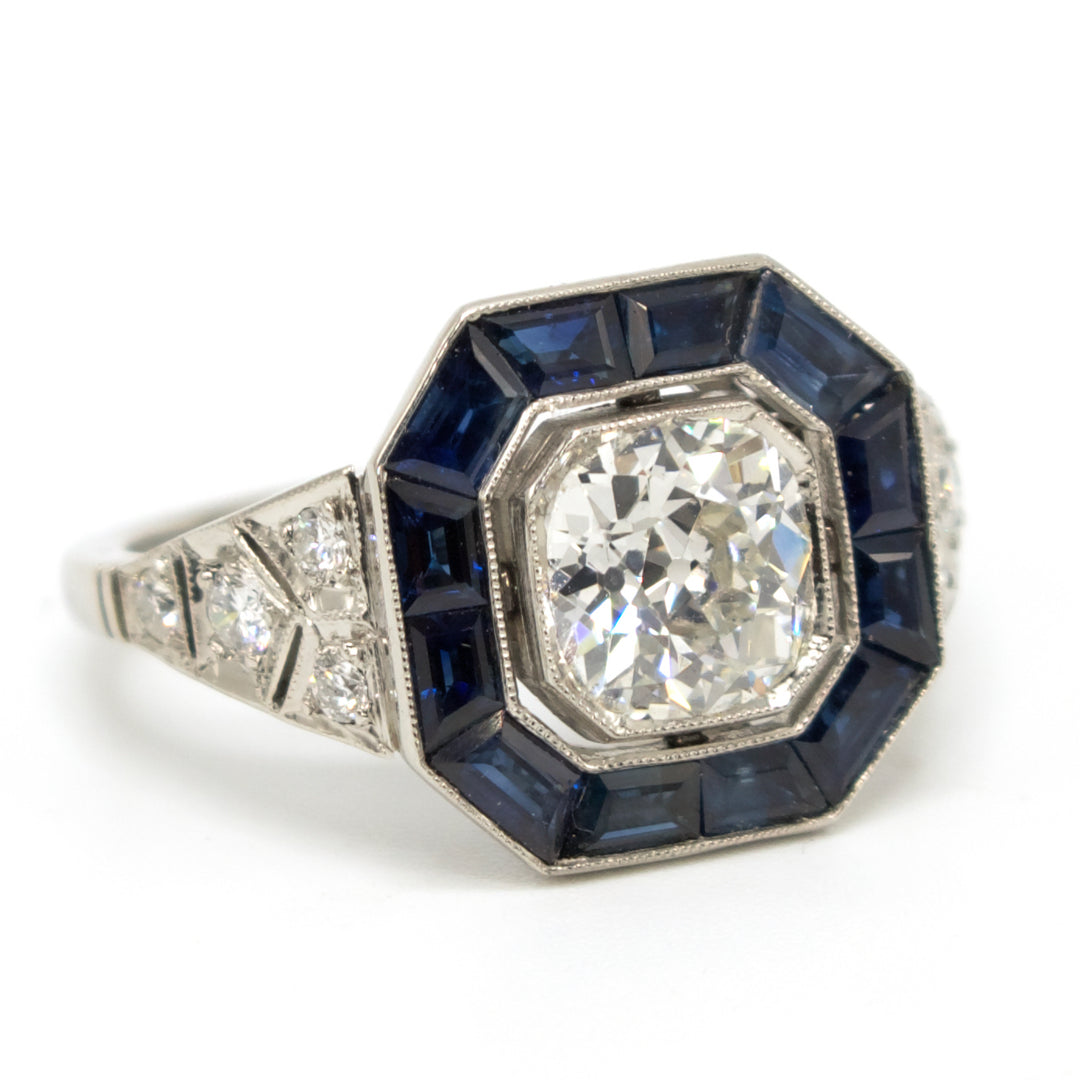 Art Deco Cushion 1.06 Carat Old Mine Cut Diamond Ring with Calibre Cut Sapphire Halo in Platinum