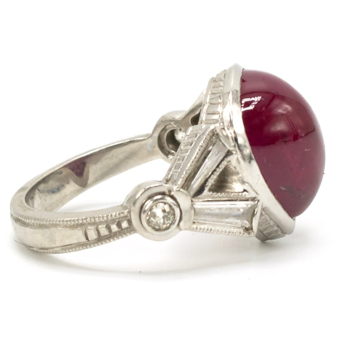 Cabochon Pear Shaped Ruby and Baguette Diamond and Platinum Ring