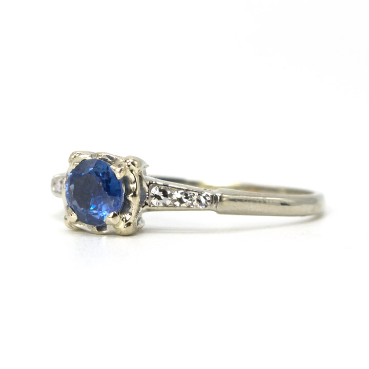 0.65ct Ceylon Blue Sapphire in 18K White Gold with Single Cut Accent Diamonds