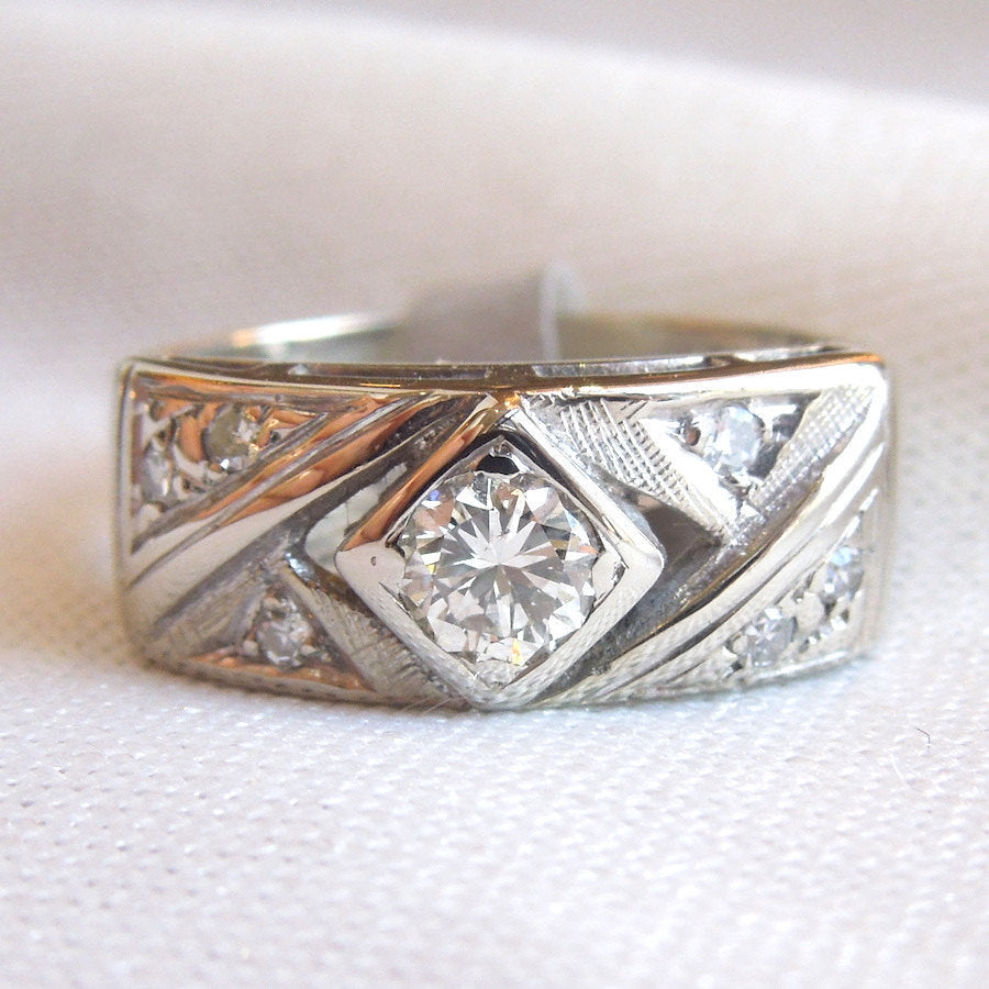 Rectangular White Gold Ring with a Third of a Carat Diamond