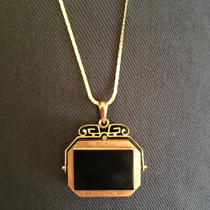Victorian Flip Locket -- Carved Onyx in 10K Yellow Gold