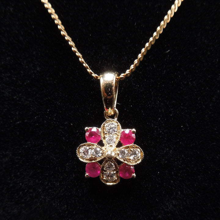 Yellow Gold Diamond and Ruby Flower Pendant