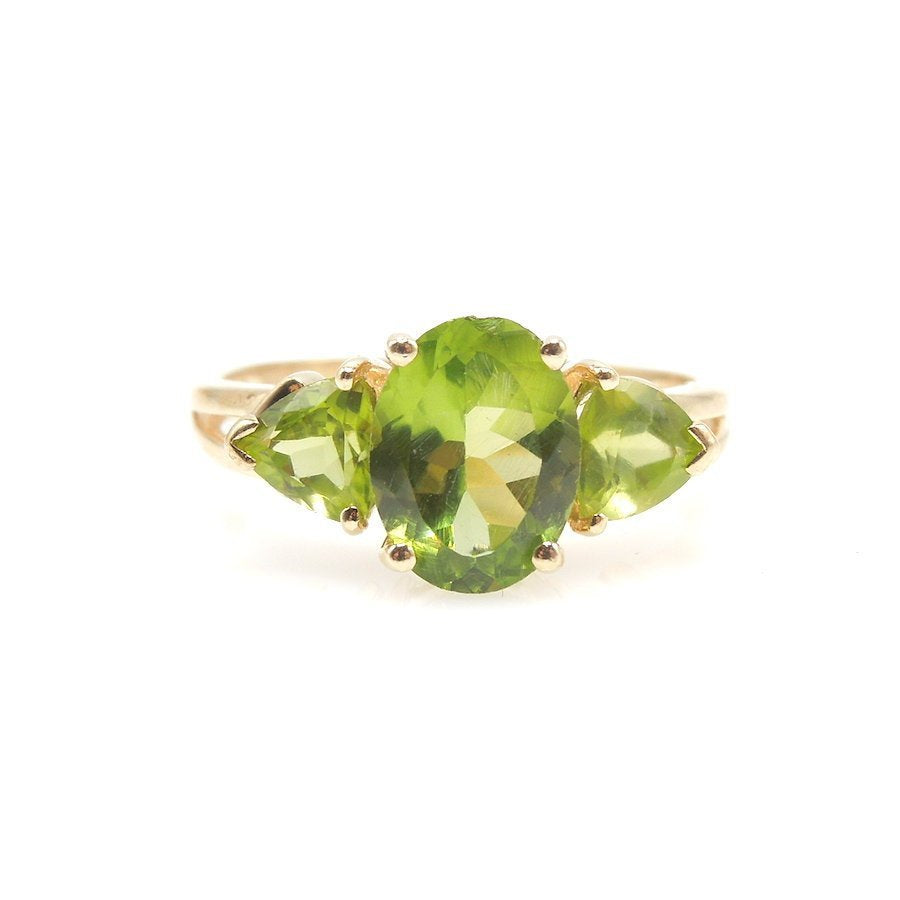 Three Stone Peridot Ring with Oval and Trillions in 14K Yellow Gold