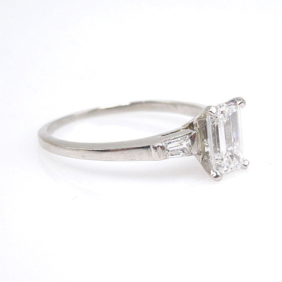 Retro Light Carat Emerald Cut Diamond Engagement Ring in Platinum with Baguettes