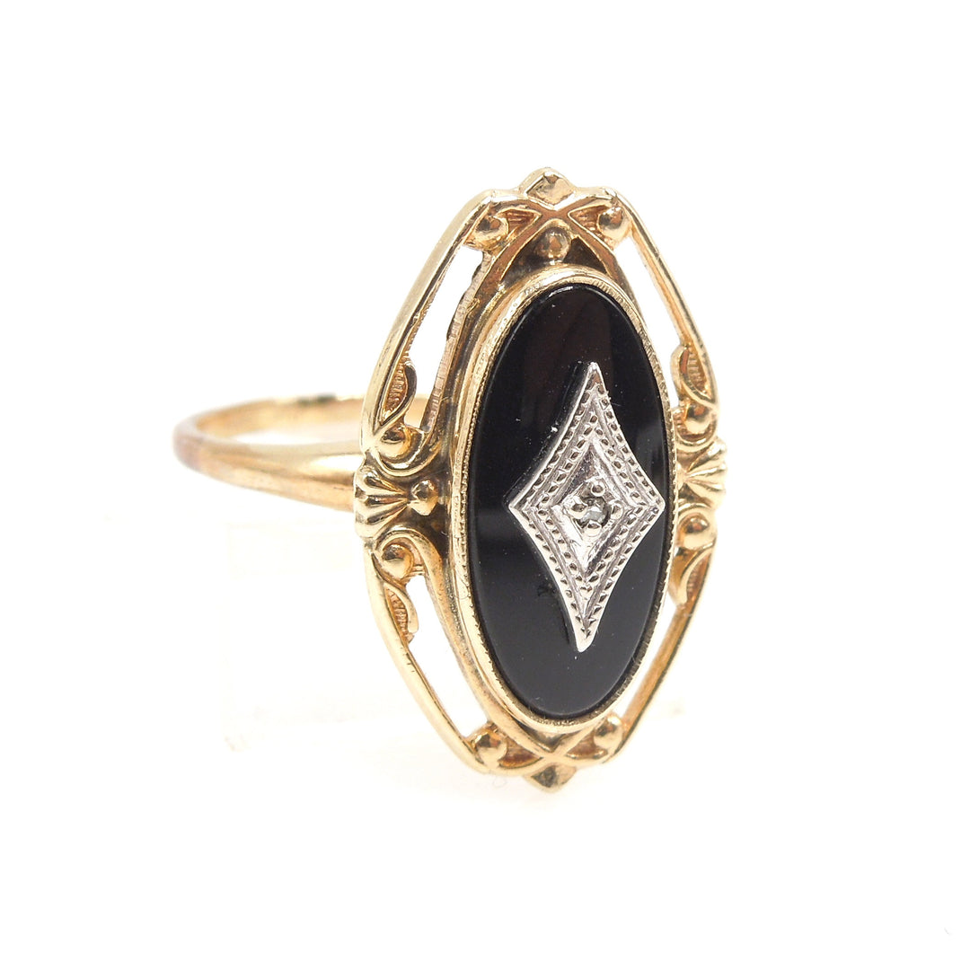 Oval Onyx (with white gold and diamond) in Filigreed Yellow Gold Mounting