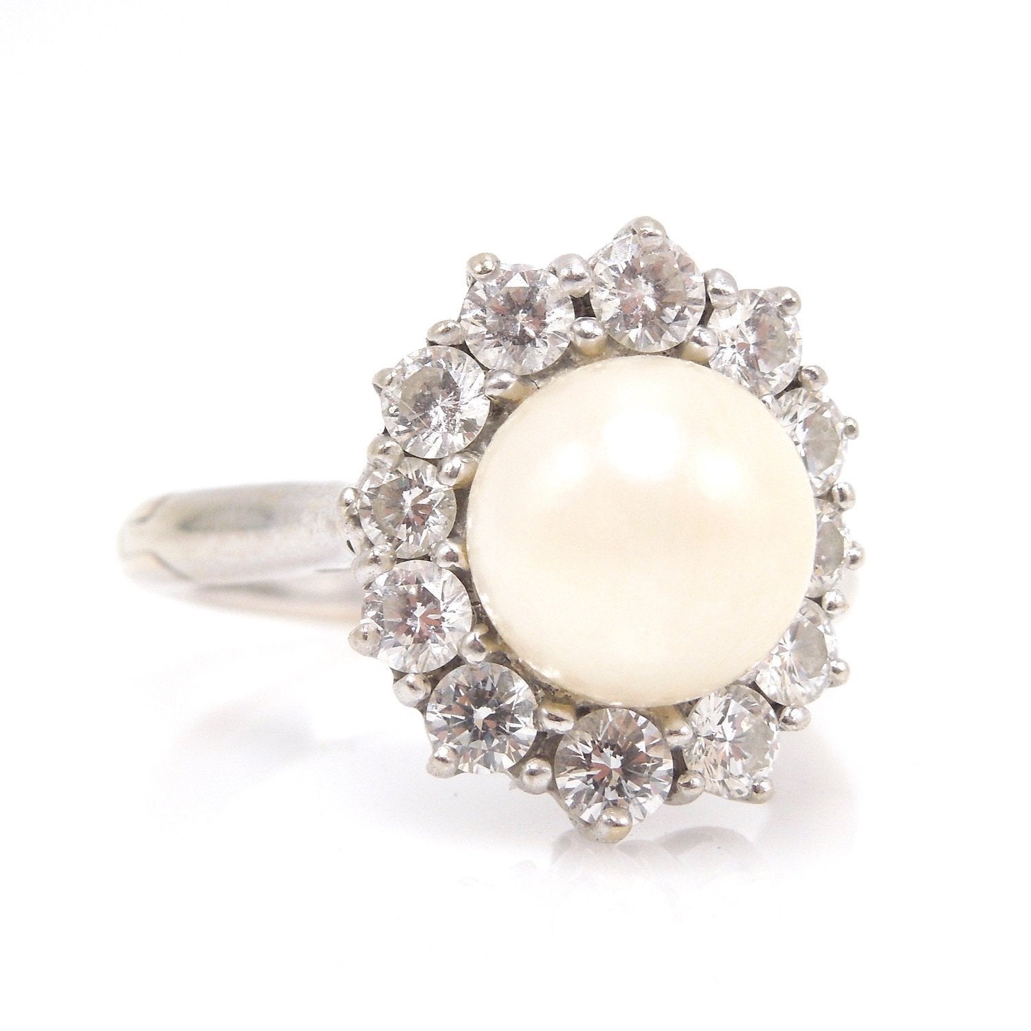 8mm White-Yellow Pearl Surrounded by Halo of 0.76ct Diamonds – A.J. Martin
