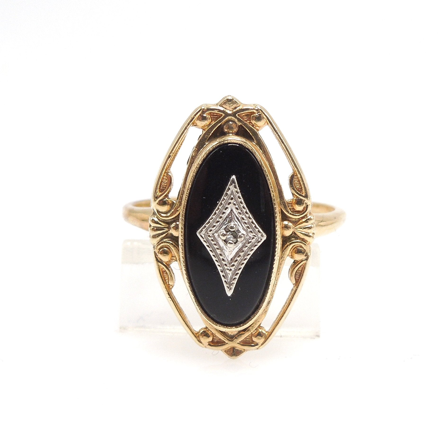 Oval Onyx (with white gold and diamond) in Filigreed Yellow Gold Mounting