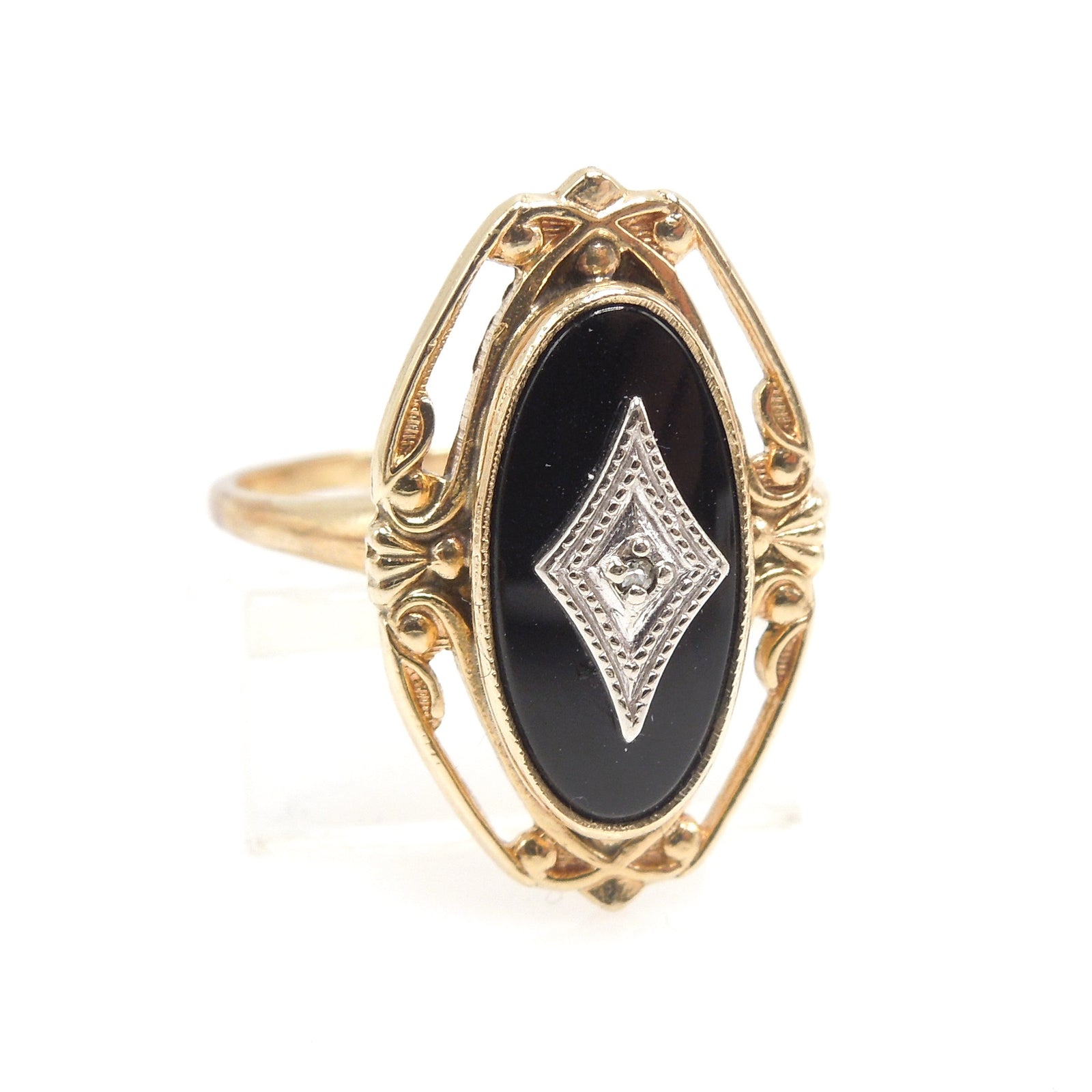 Oval Onyx (with white gold and diamond) in Filigreed Yellow Gold Mounting