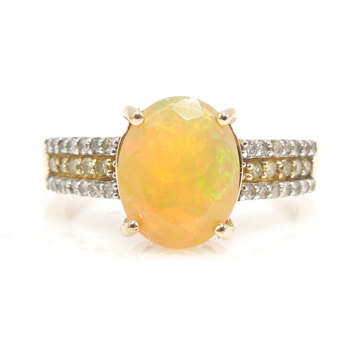 Faceted Fiery Gray Crystal Opal Ring with White Diamonds and Yellow Diamonds in Yellow Gold