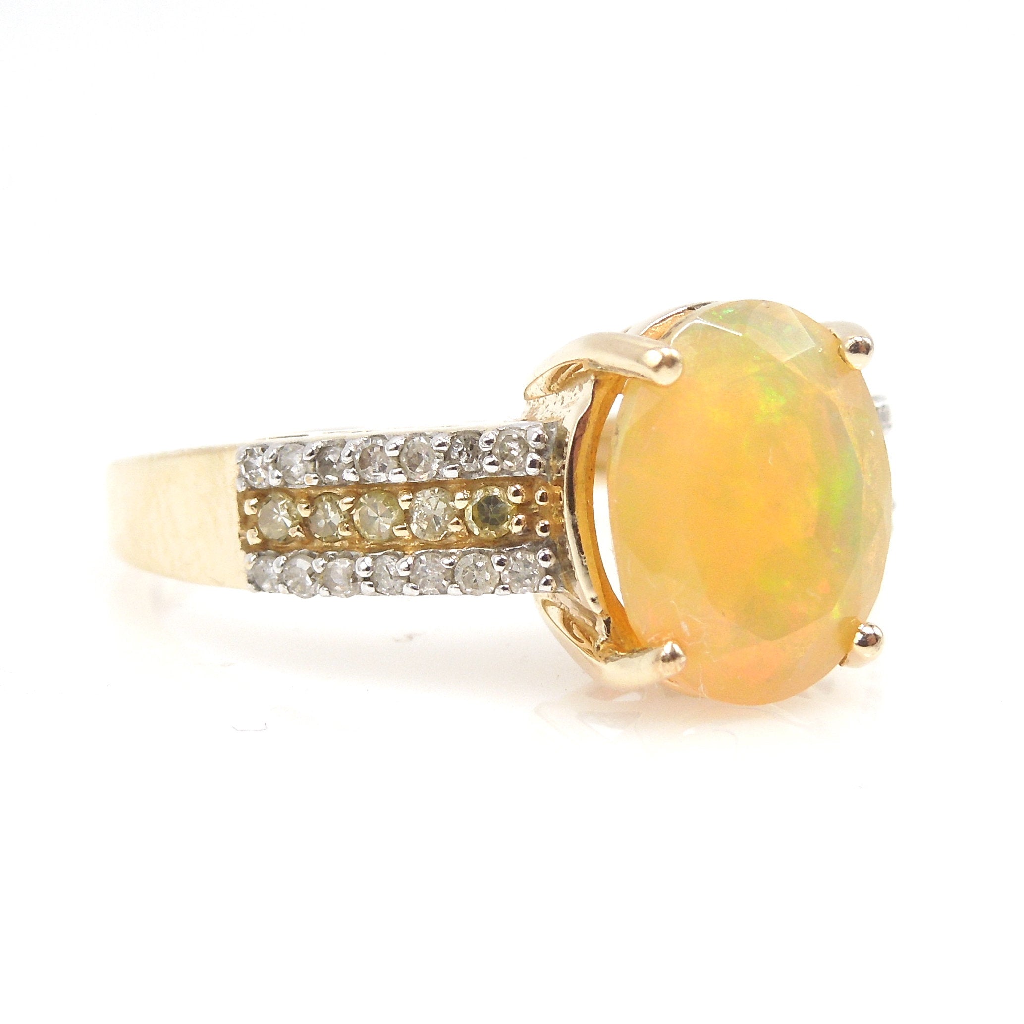 Faceted Fiery Gray Crystal Opal Ring with White Diamonds and Yellow Diamonds in Yellow Gold