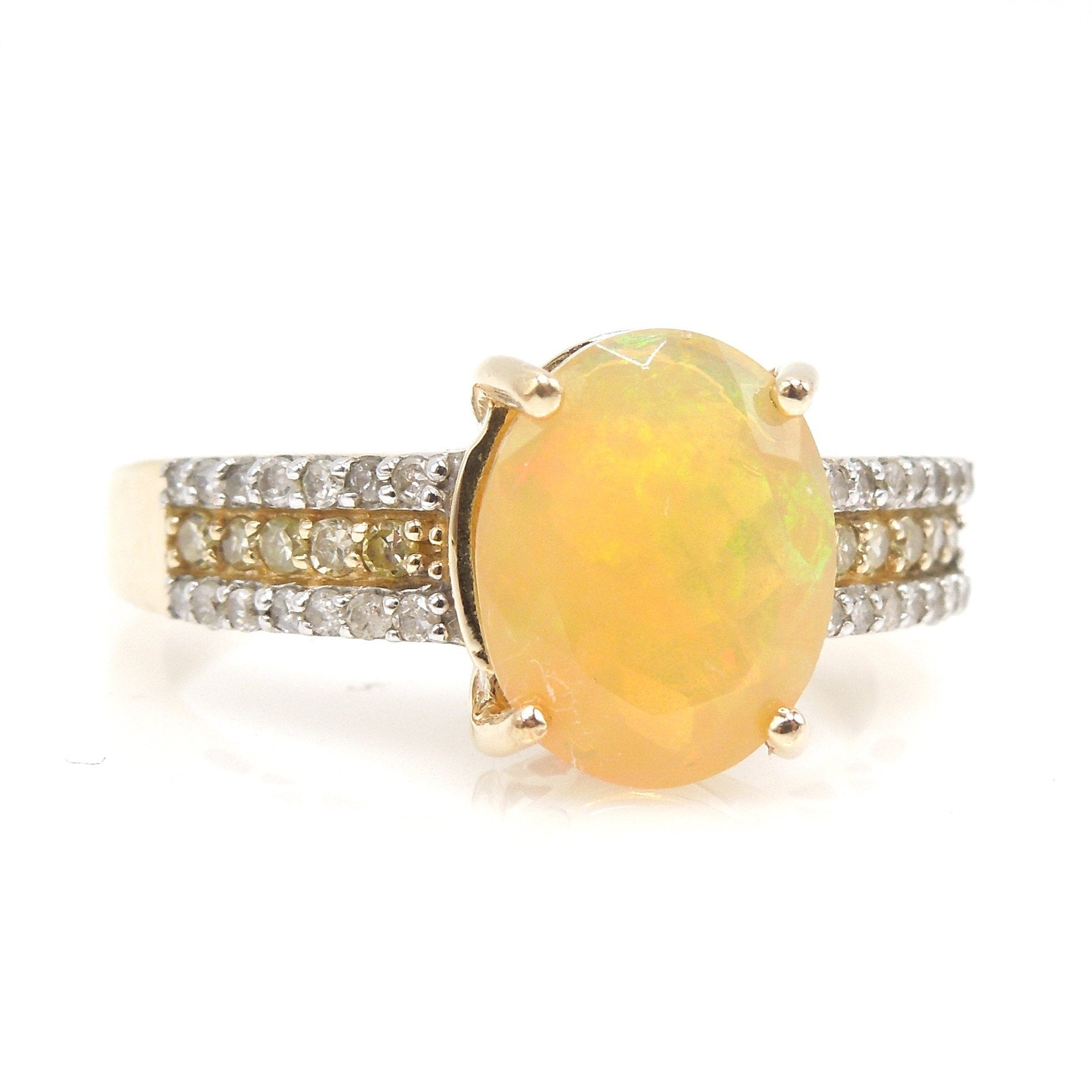 Faceted Fiery Gray Crystal Opal Ring with White Diamonds and Yellow Diamonds in Yellow Gold