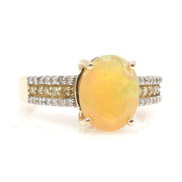 Faceted Fiery Gray Crystal Opal Ring with White Diamonds and Yellow Diamonds in Yellow Gold