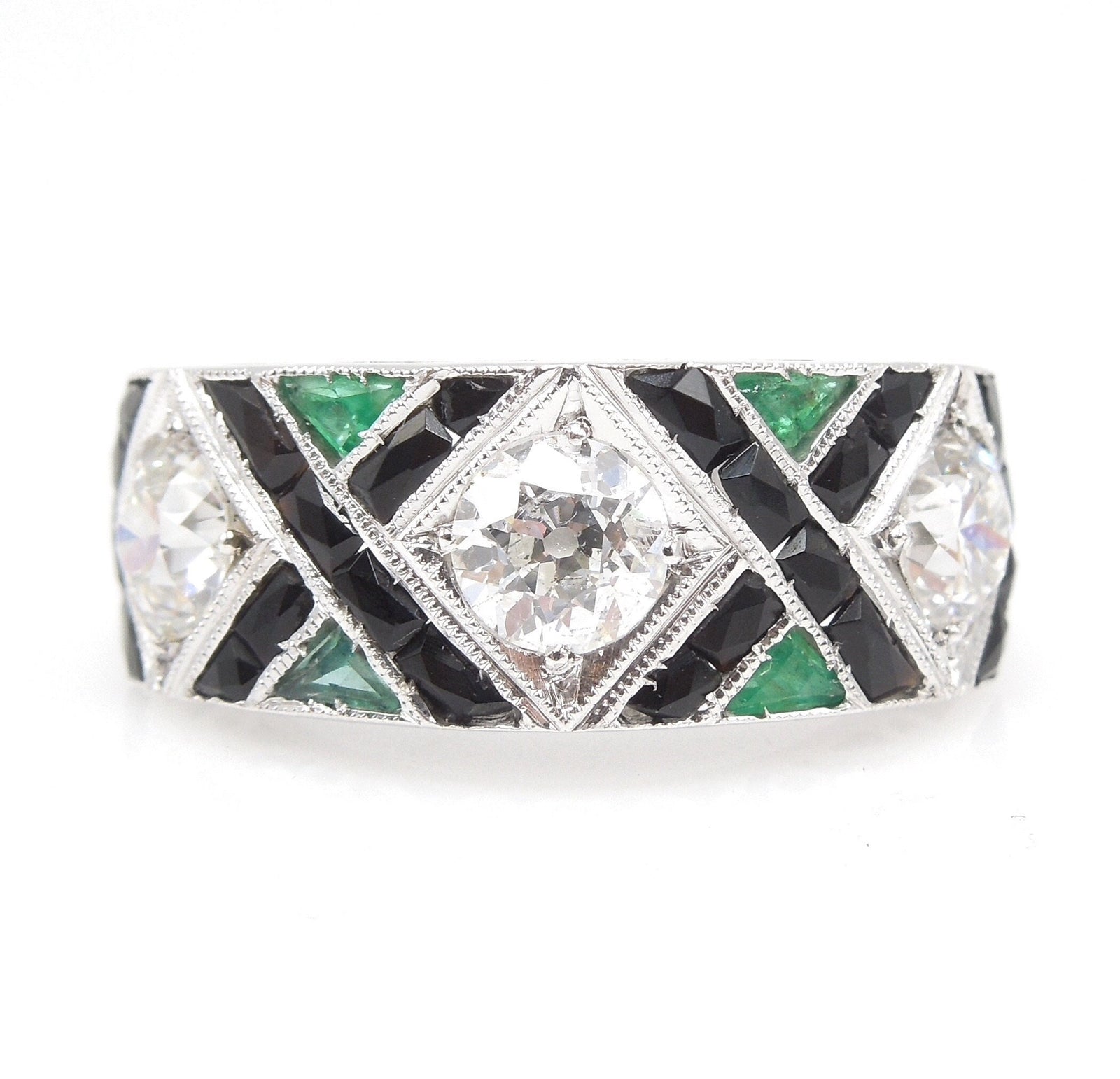 1920s Art Deco Three Diamond Ring with Emerald and Onyx Accents in Platinum