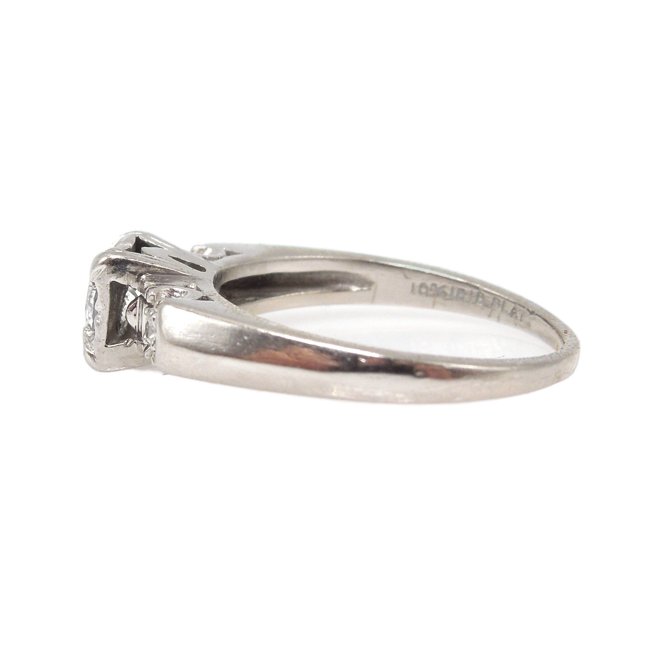Quarter Carat (0.25ct) Platinum Illusion Set Diamond Engagement Ring with Accent Diamonds