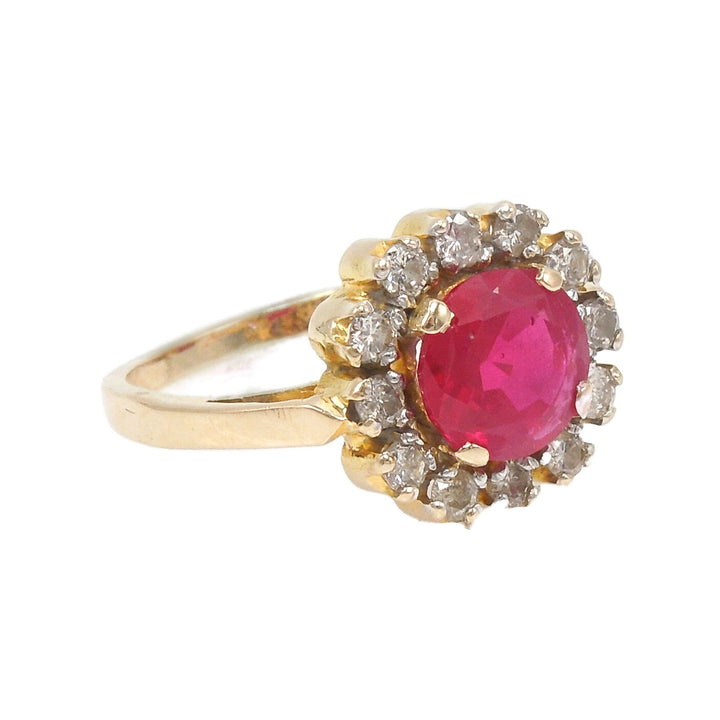 2 carat +/- Ruby with 0.49ct Diamond Halo Ring in 18K Yellow Gold