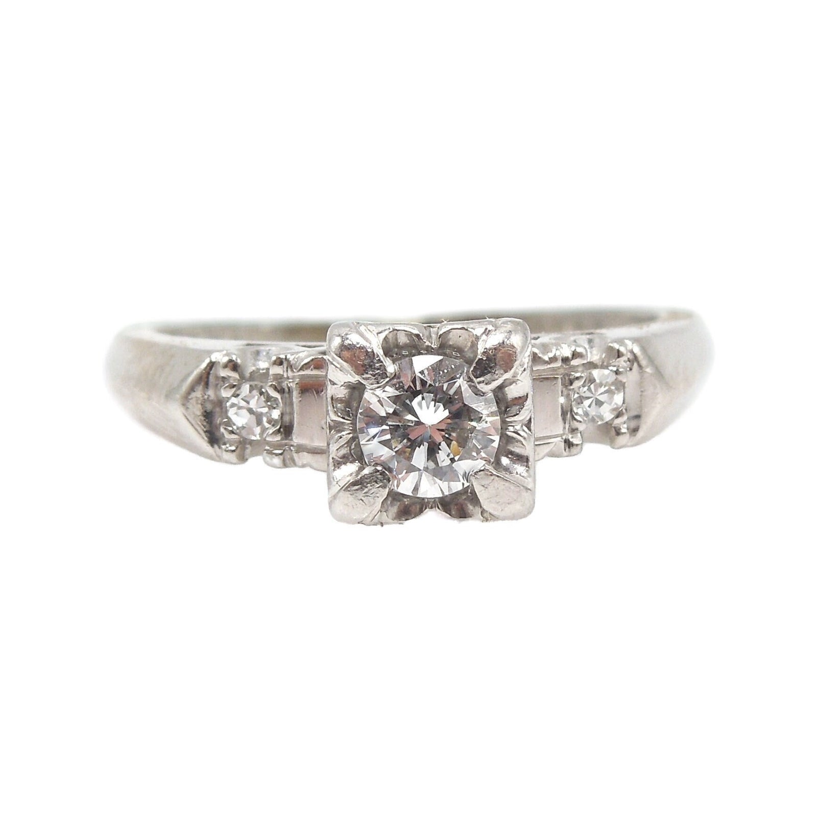 Quarter Carat (0.25ct) Platinum Illusion Set Diamond Engagement Ring with Accent Diamonds
