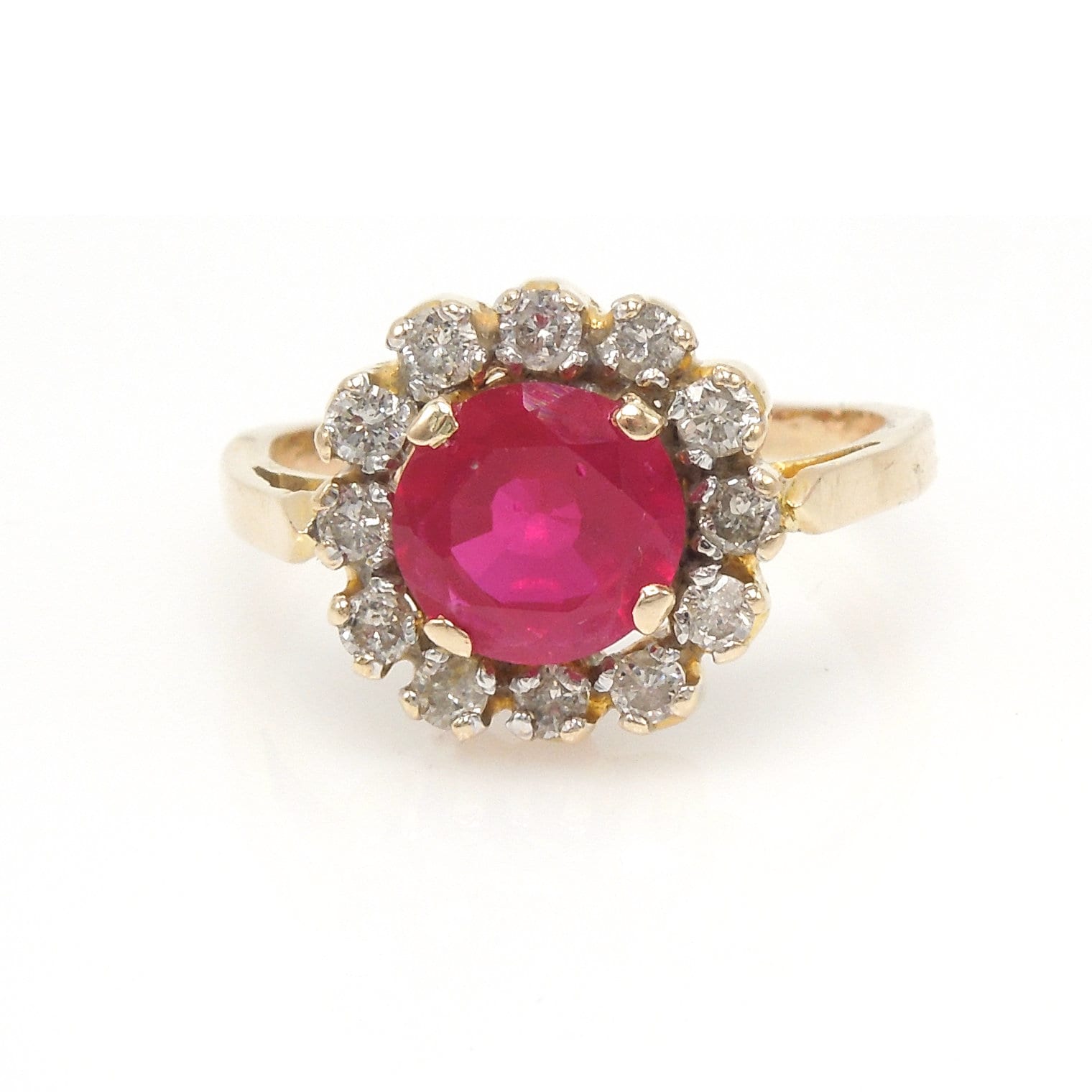2 carat +/- Ruby with 0.49ct Diamond Halo Ring in 18K Yellow Gold