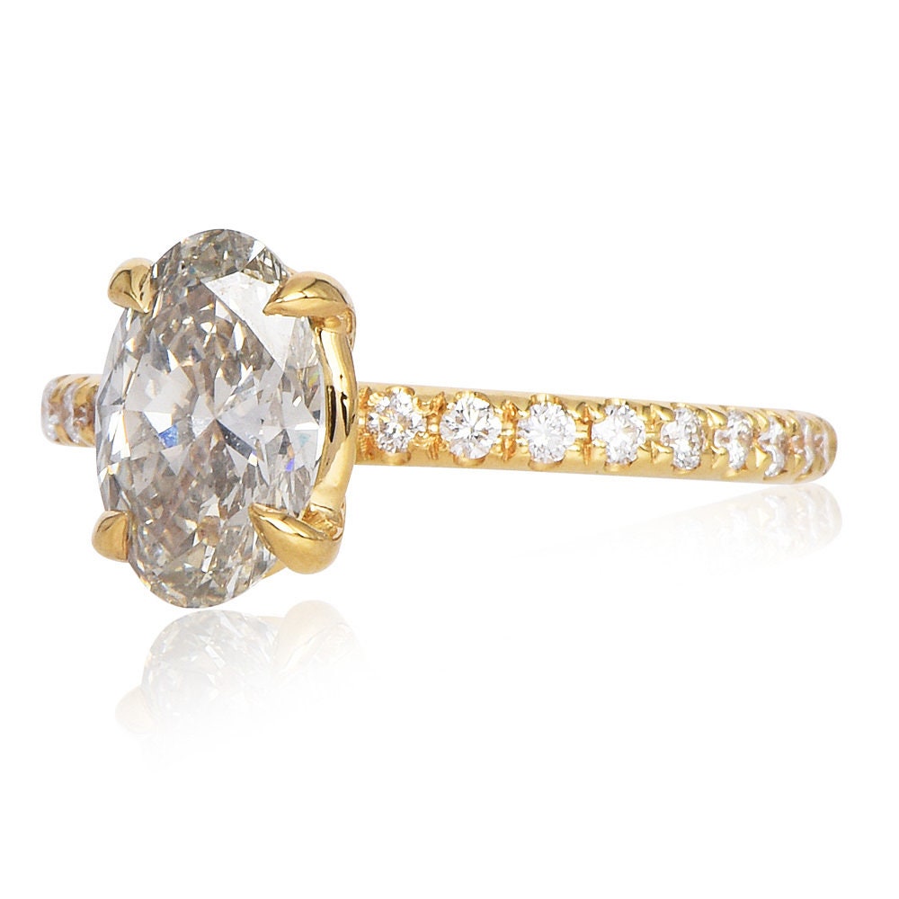 1.53ct Oval Diamond Solitaire in 18K Yellow Gold with Accent Diamonds