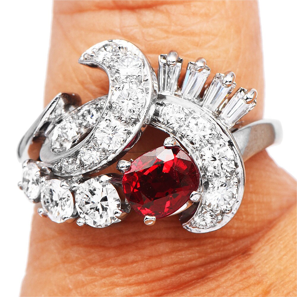 1940s Retro Diamond and Oval Ruby Swirl Ring in Platinum
