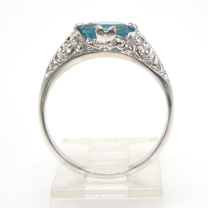 Art Deco Style Filigree Ring in 14K White Gold with Oval Blue Zircon Set Sideways