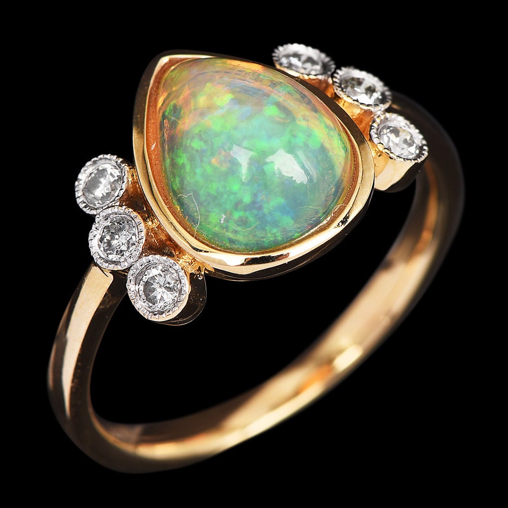 Vintage Oscar Friedman Pear Cut Opal and Diamond Ring in Yellow Gold