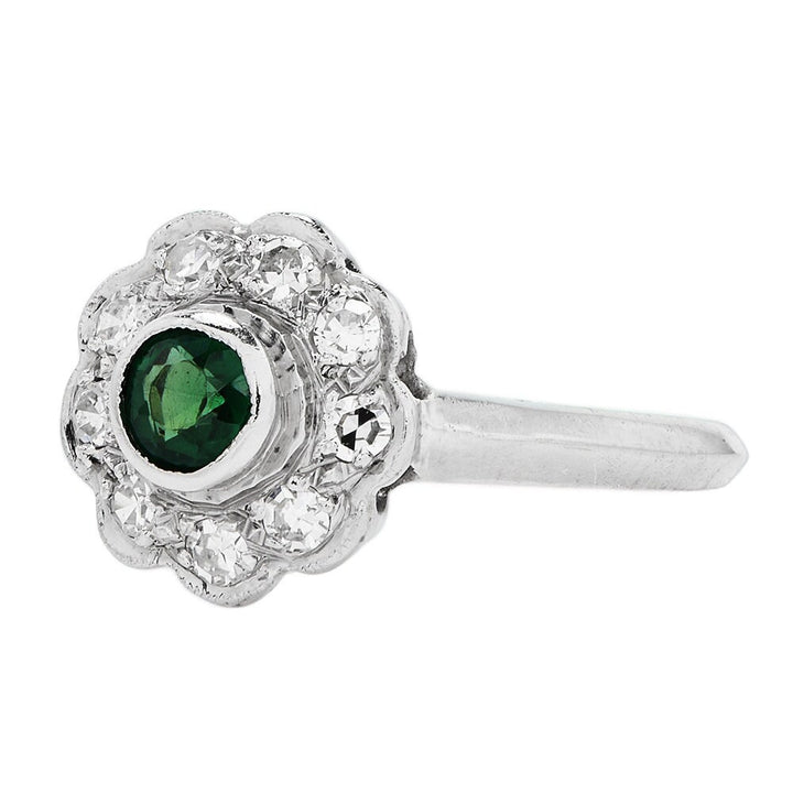 Vintage Emerald and Diamond Floral Halo Ring in Platinum