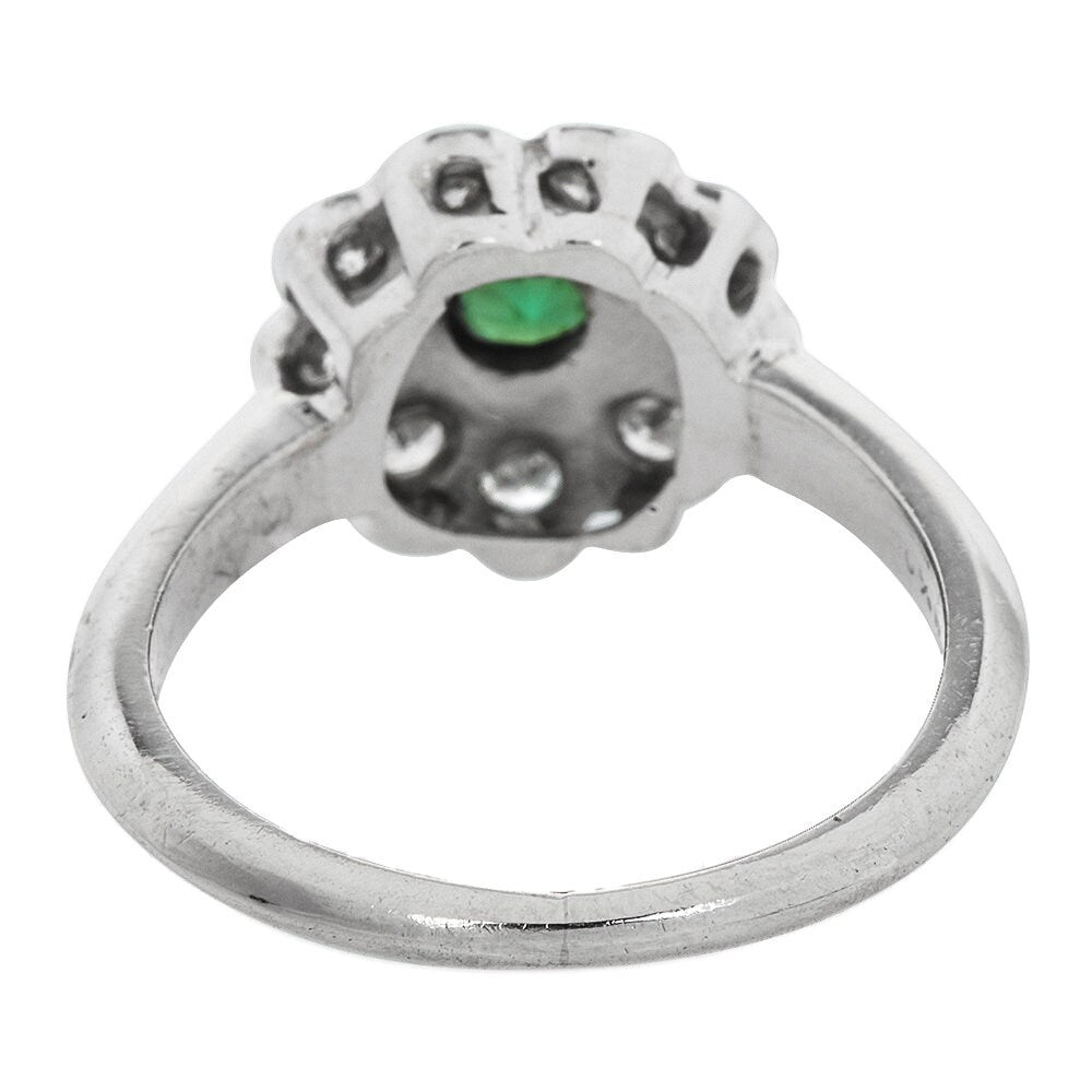 Vintage Emerald and Diamond Floral Halo Ring in Platinum