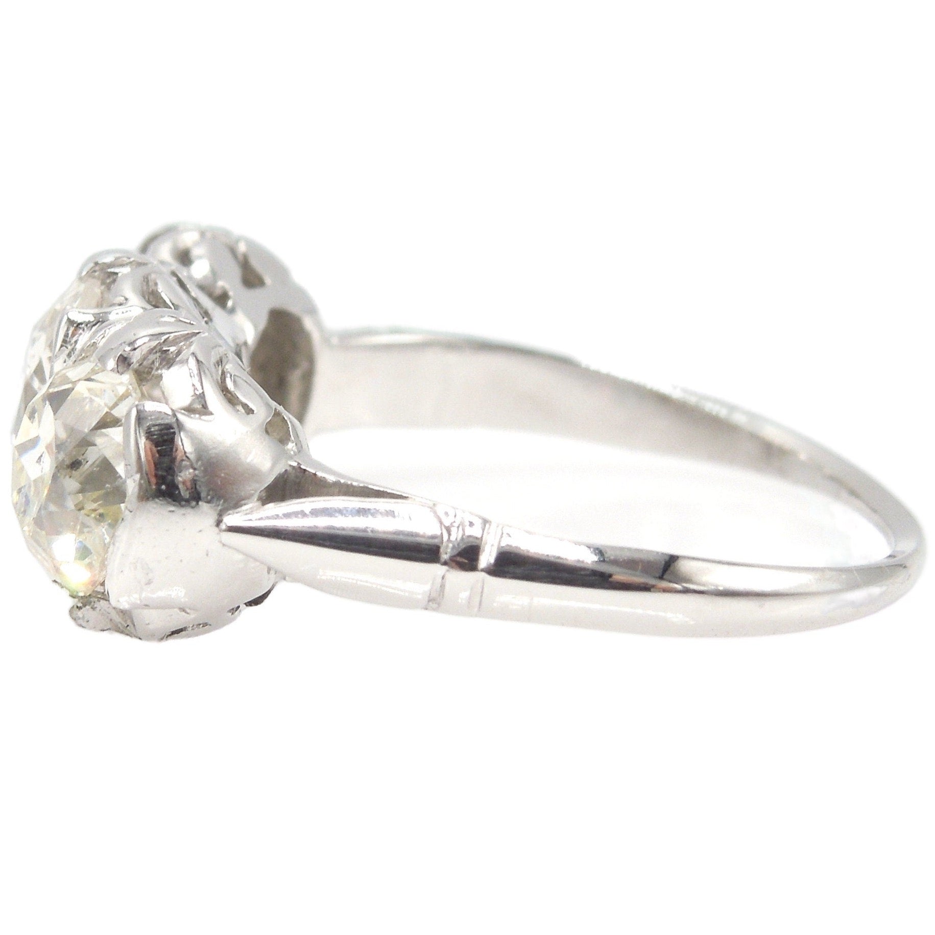 Filigree Art Deco Three Stone Old Mine Cut Diamond Ring in Platinum