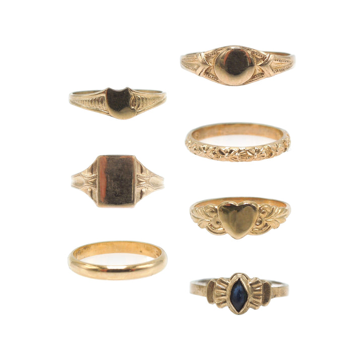 Lot of 10K Yellow Gold Baby Rings - Half Round, Signet, Sapphire, Heart, Floral Motif