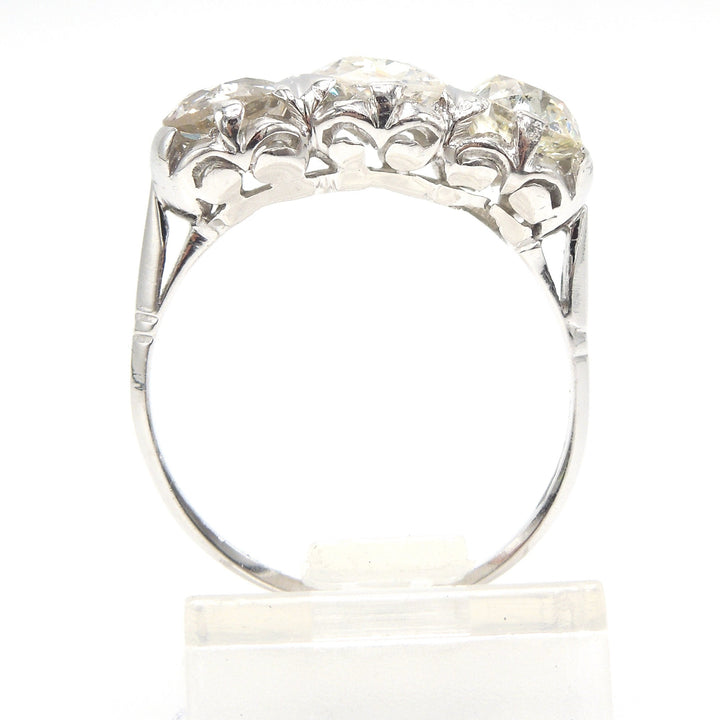 Filigree Art Deco Three Stone Old Mine Cut Diamond Ring in Platinum