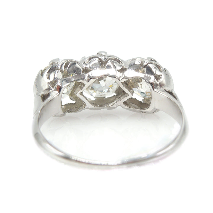 Filigree Art Deco Three Stone Old Mine Cut Diamond Ring in Platinum