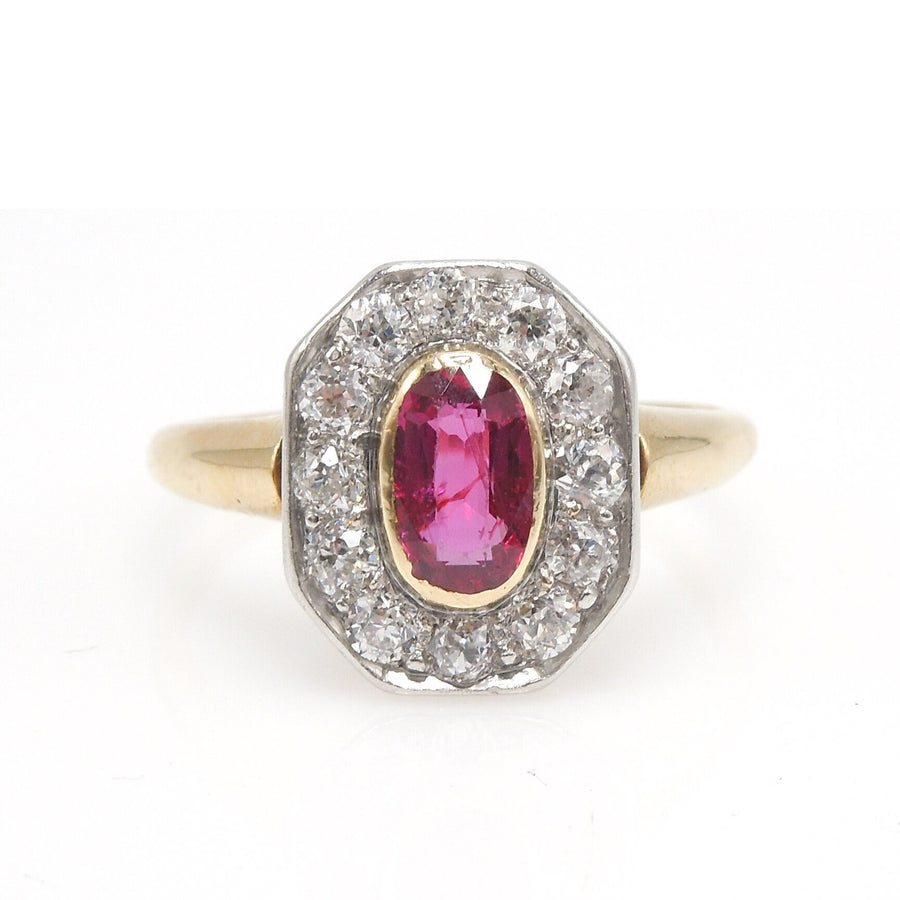 Antique 18K Yellow and White Gold Oval Ruby Ring with Octagonal Halo