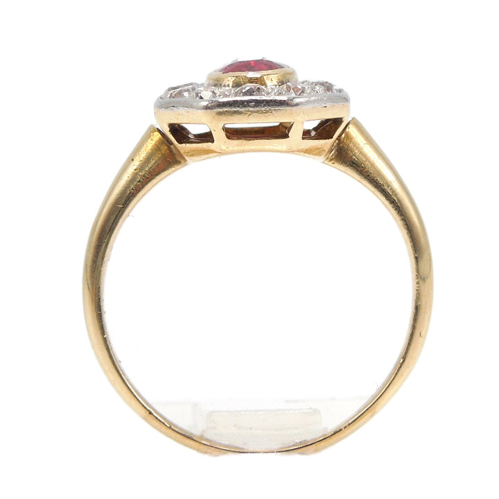 Antique 18K Yellow and White Gold Oval Ruby Ring with Octagonal Halo