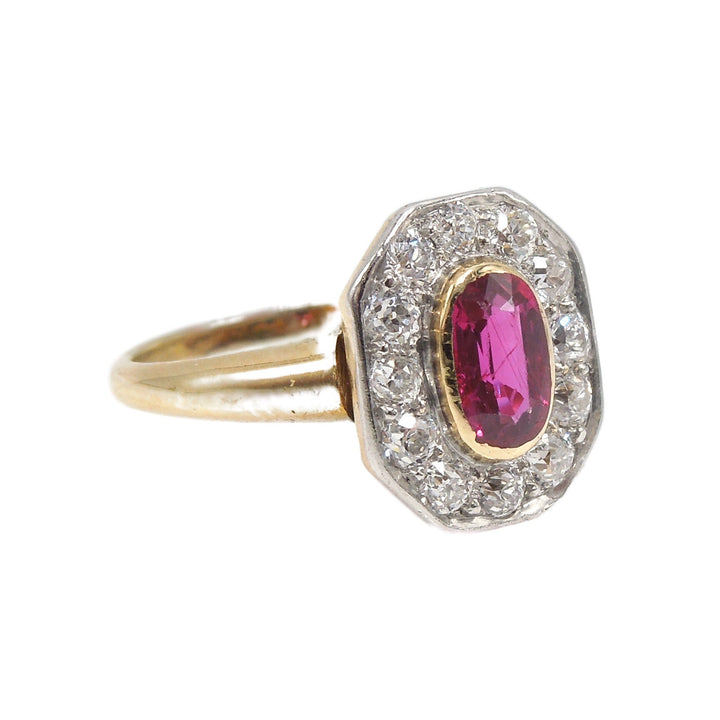 Antique 18K Yellow and White Gold Oval Ruby Ring with Octagonal Halo