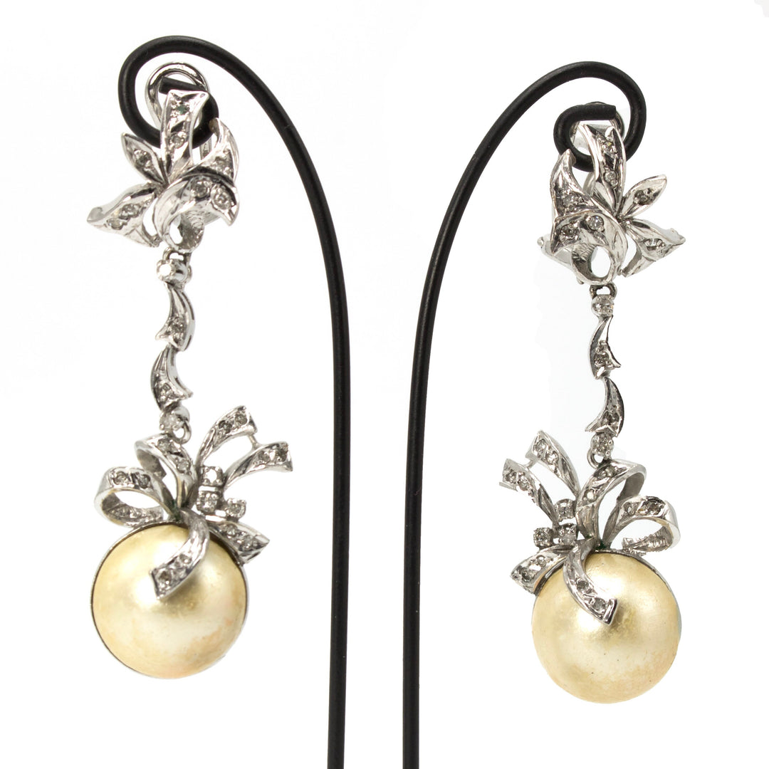 White Gold, Diamond, and Mabe Pearl Bow Motif Long Drop Earrings