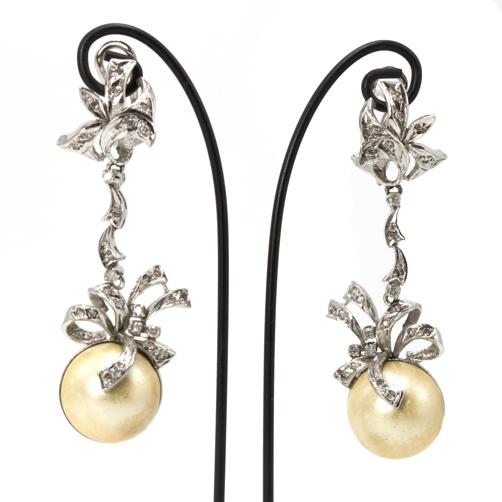 White Gold, Diamond, and Mabe Pearl Bow Motif Long Drop Earrings