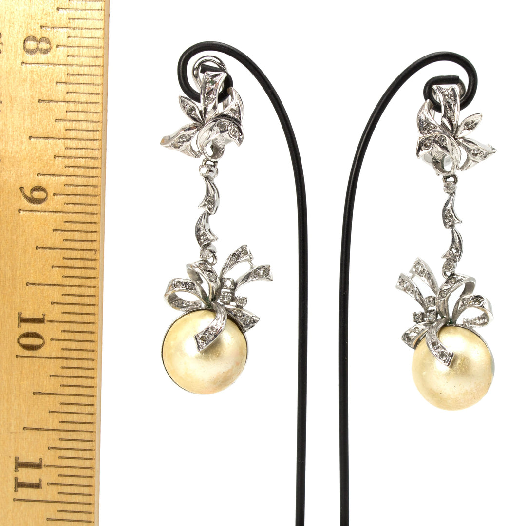 White Gold, Diamond, and Mabe Pearl Bow Motif Long Drop Earrings