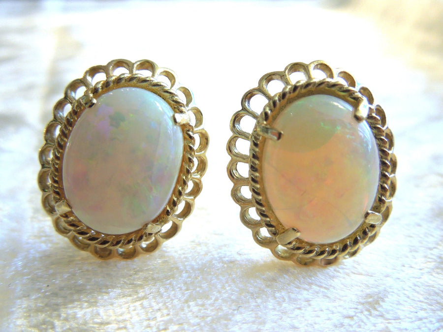 Oval White Opal in 14K Yellow Gold French Back Earrings