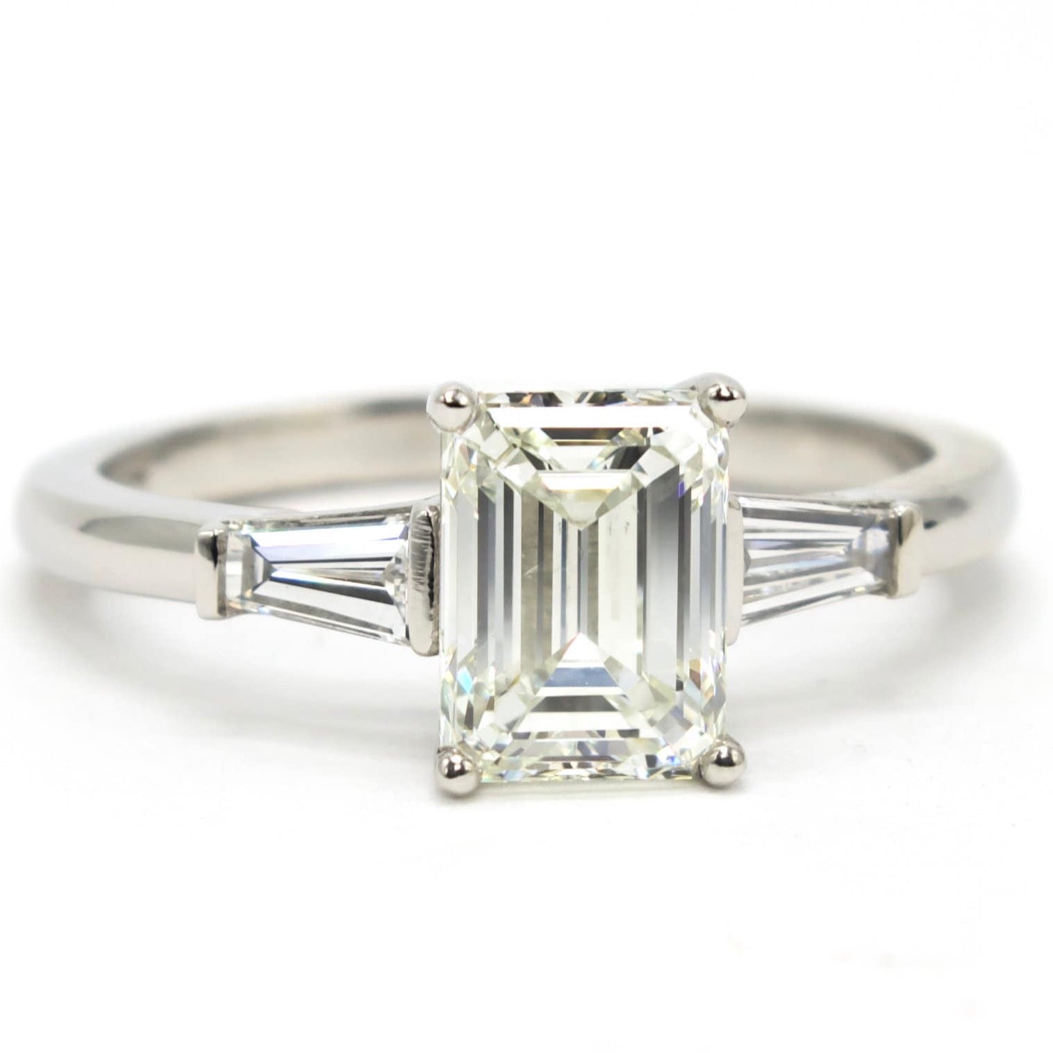 1.50 carat Emerald Cut Diamond Solitaire with Tapered Baguettes in Platinum