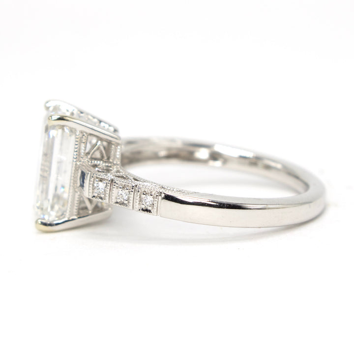 3.08 carat Emerald Cut Lab Grown Diamond in White Gold with Geometric Sapphire Art Deco Style Ring Guards