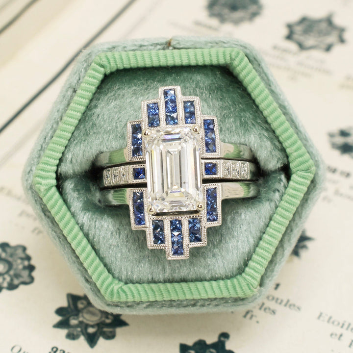 3.08 carat Emerald Cut Lab Grown Diamond in White Gold with Geometric Sapphire Art Deco Style Ring Guards