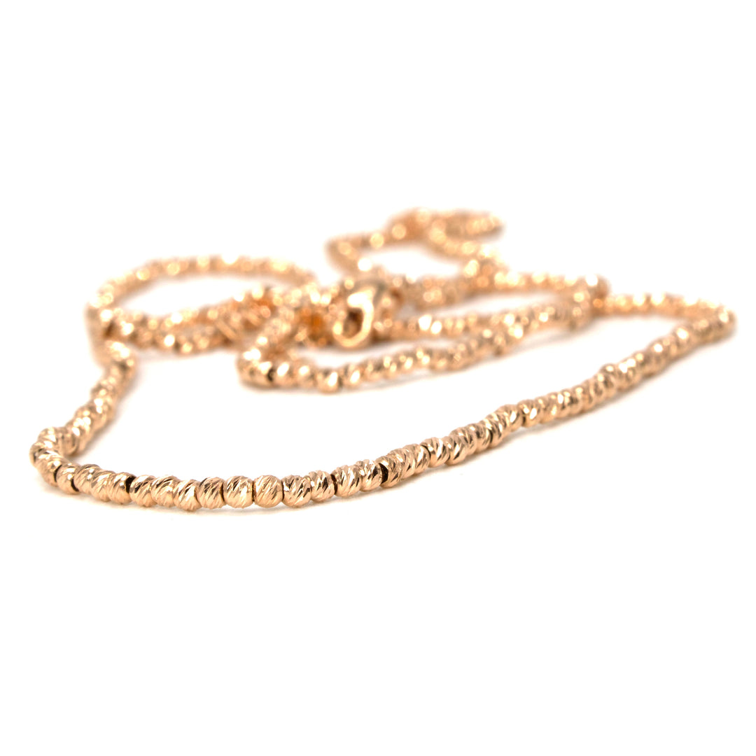 24" 14K Diamond Cut Rose Gold Bead Necklace A.J. Martin Estate Jewelry, Etc. 24" 14K Diamond Cut Rose Gold Bead Necklace A.J. Martin Estate Jewelry, Etc.