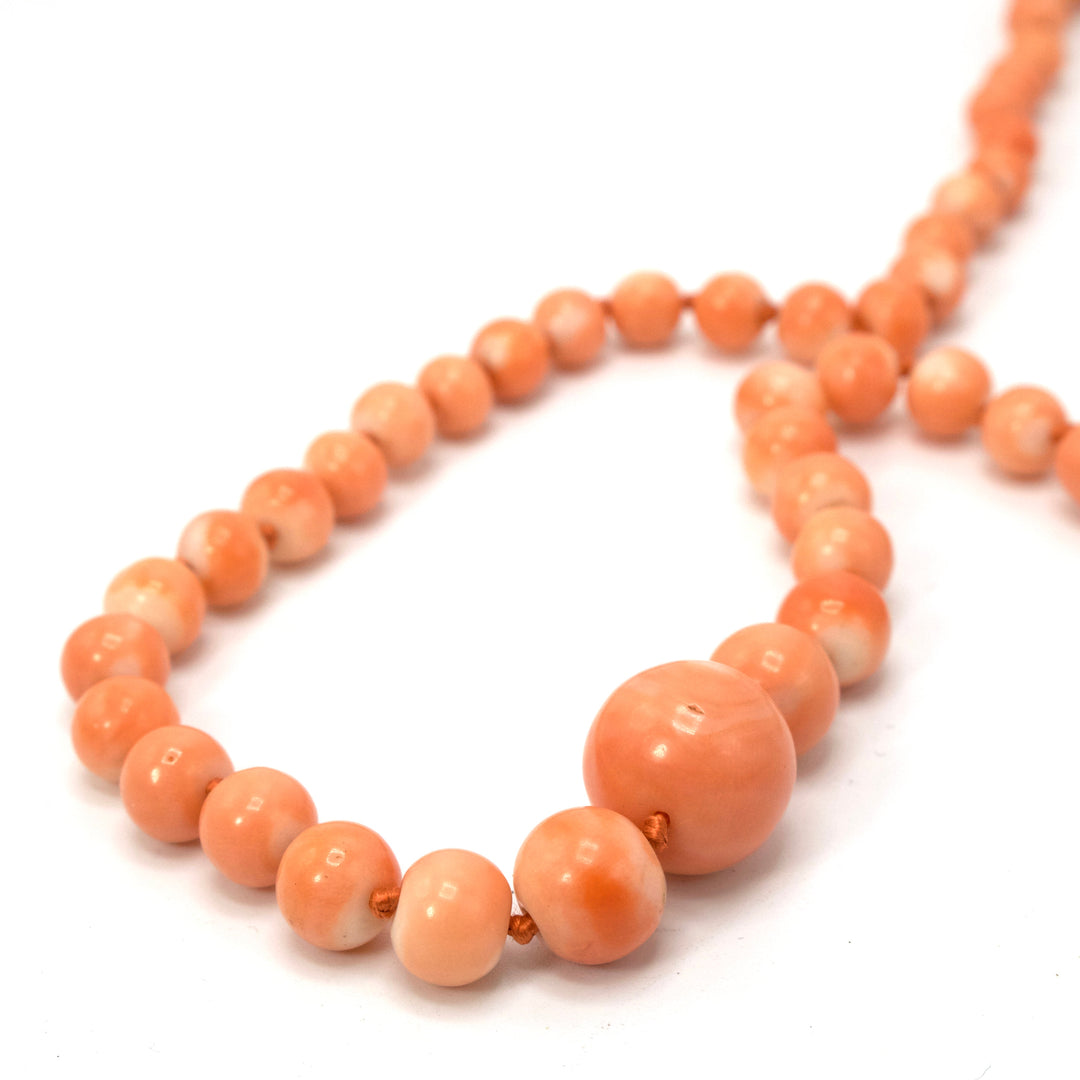 20 Inch Pinkish Orange Coral Bead Necklace