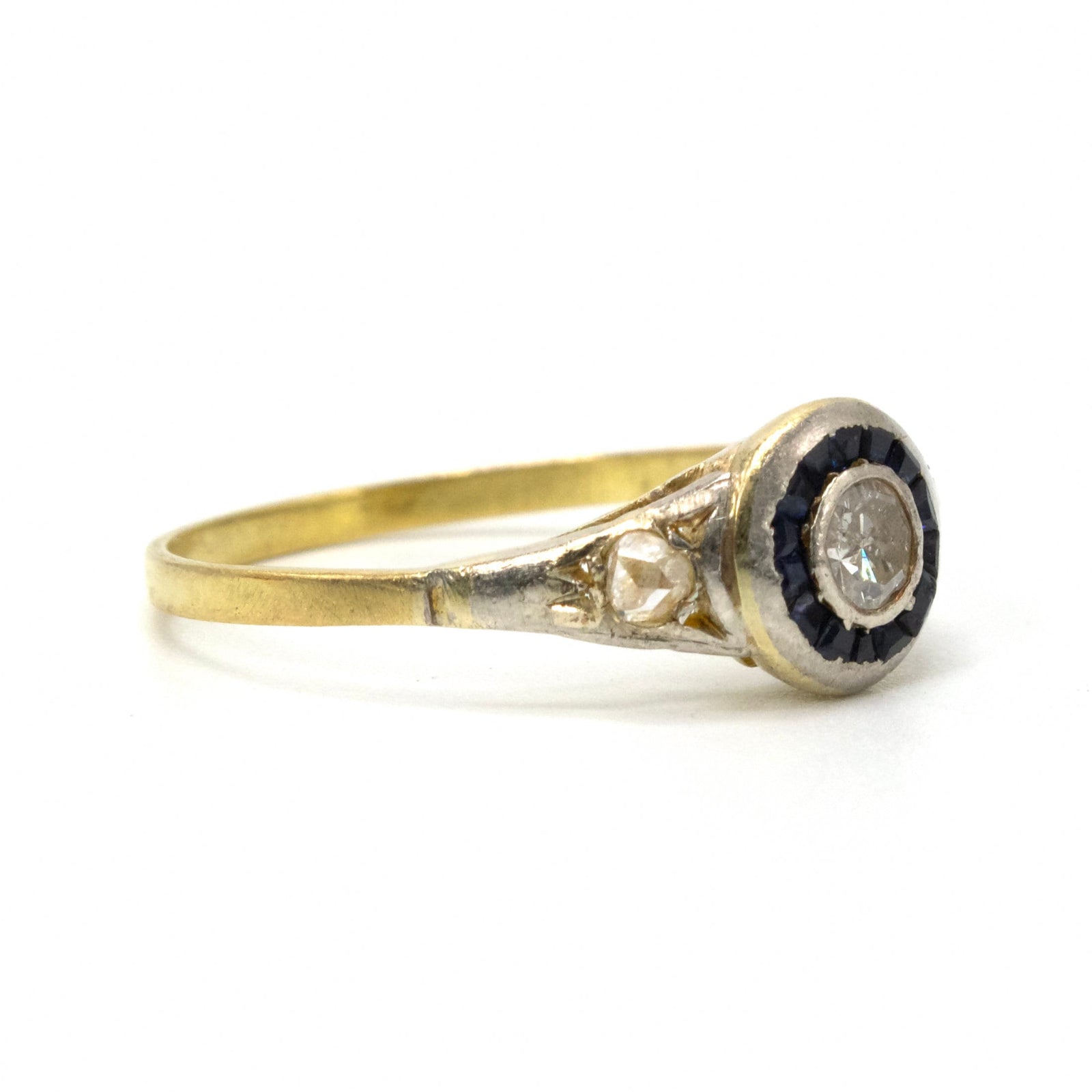 Edwardian Platinum and Yellow Gold Diamond Engagement Ring with Sapphire Halo