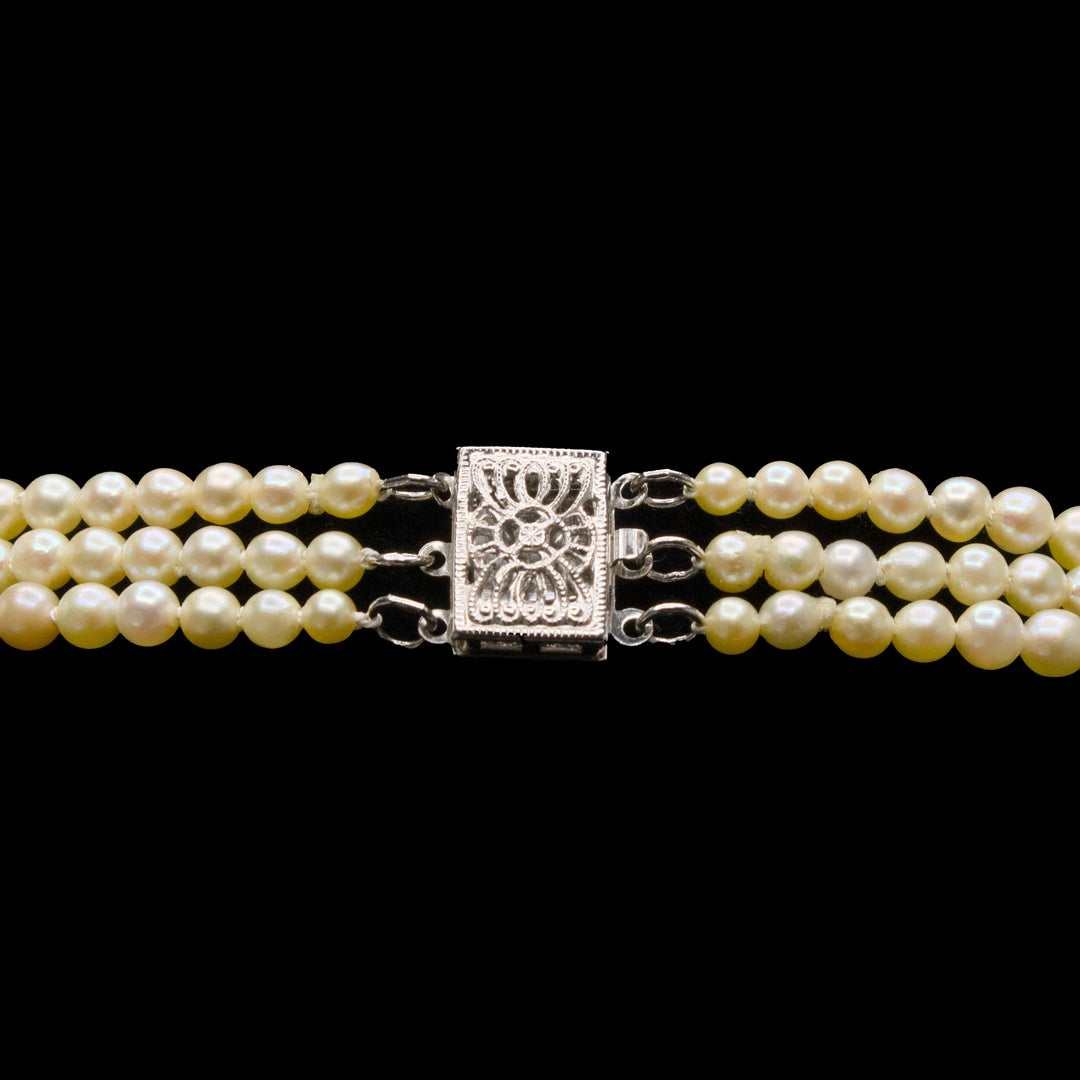 Triple Strand of Graduated Cream Colored Akoya Pearls with 14K White Gold Clasp