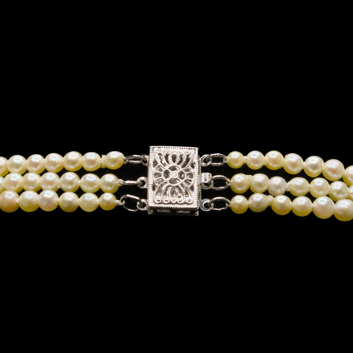 Triple Strand of Graduated Cream Colored Akoya Pearls with 14K White Gold Clasp