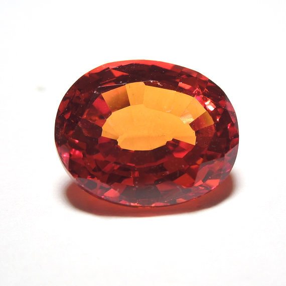 5.77 ct Rich Orange Red Oval Cut Sapphire